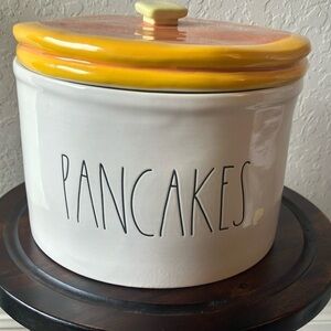Rae Dunn: White “Pancake” container with lid- mark on side
